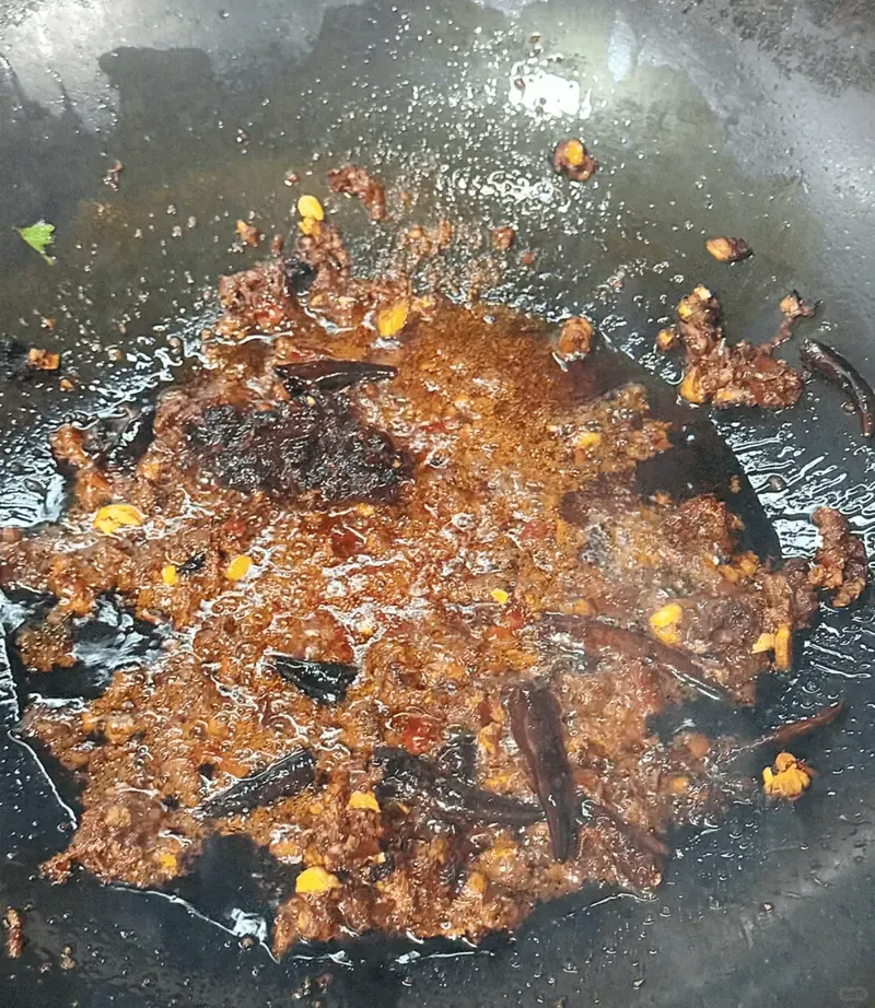 Beef poaching in spicy broth